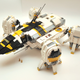 Illustration for article titled These LEGO emPrometheus/em models need tiny, smarmy androids